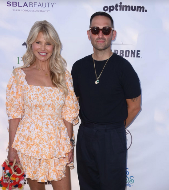 Chef Mario Carbone and Christie Brinkley at Polo Hamptons 2022. Sponsored by Carbone Fine Food.