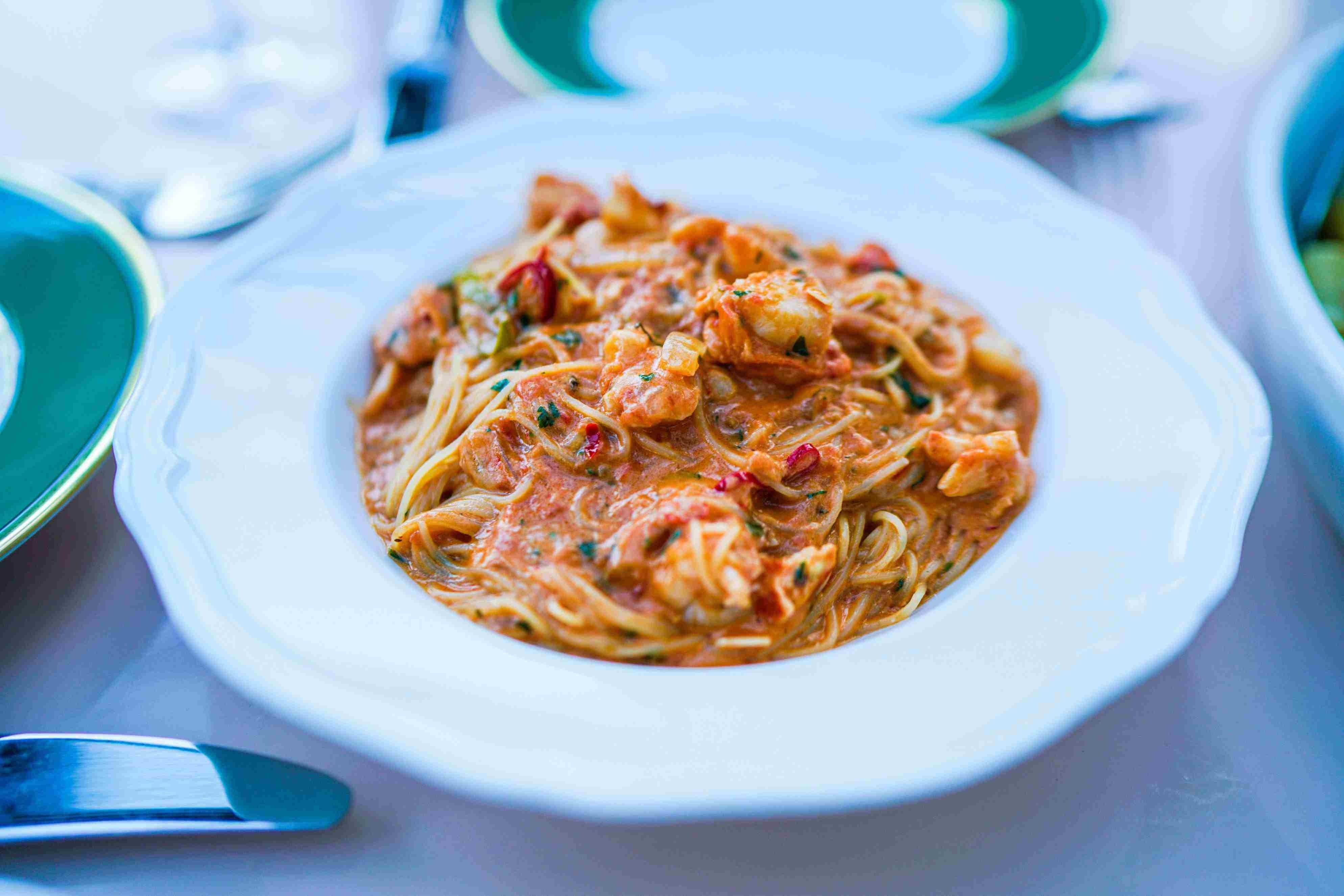 Spicy lobster capellini plated