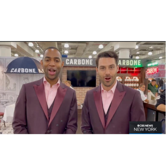 Burgundy boys welcome Fancy Food 2022 attendees to Carbone Fine Food's booth. Modeled after the famous Carbone New York and serving pasta to everyone at the show.